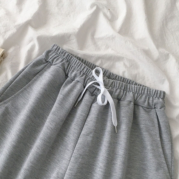 Vabaaja püksid lipsu ja elastse vöökohaga