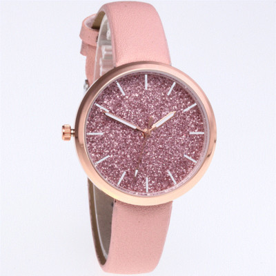 Modern női karóra bőr szíjjal és fényes részecskékkel