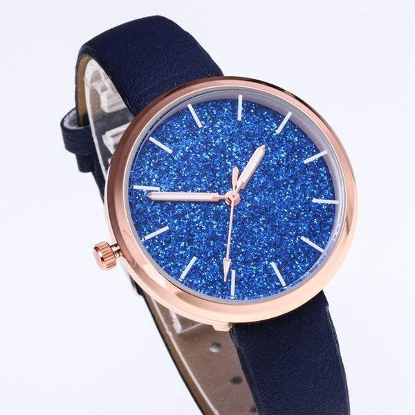 Modern női karóra bőr szíjjal és fényes részecskékkel