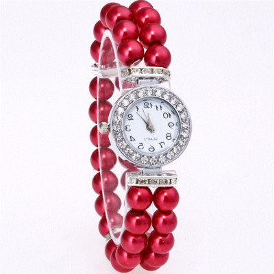 Μοντέρνο γυναικείο ρολόι με πέρλες και πέτρες