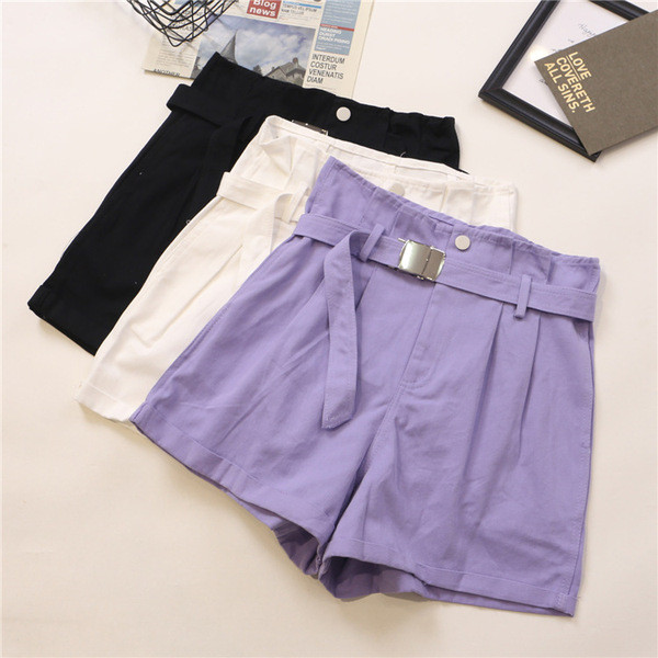 Női széles nadrág övvel és zsebekkel