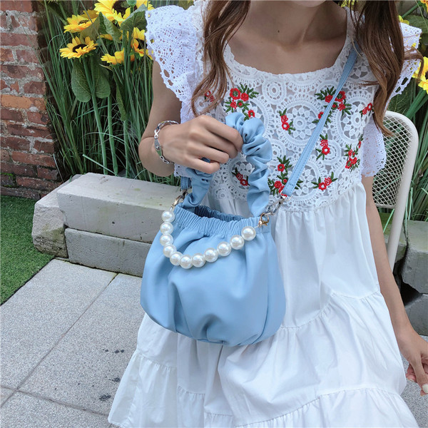 Napi női válltáska gyöngyökkel