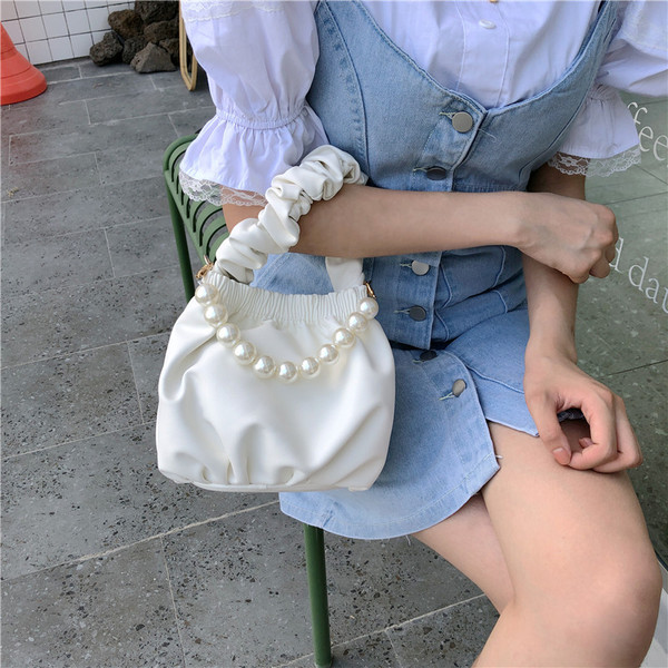 Napi női válltáska gyöngyökkel