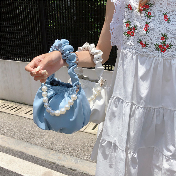 Napi női válltáska gyöngyökkel