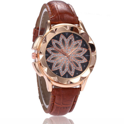 Γυναικείο ρολόι με διακοσμιτικές πέτες και δερμάτινο λουράκι