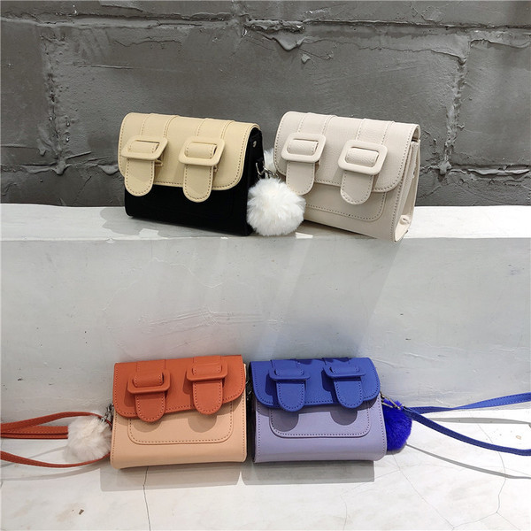 Ženska mini torbica s dugom ručkom