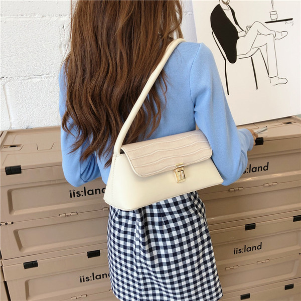 Női eco-bőr válltáska rövid fogantyúval