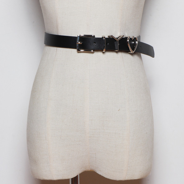 Lezser női fekete ekobőr öv fém elemekkel