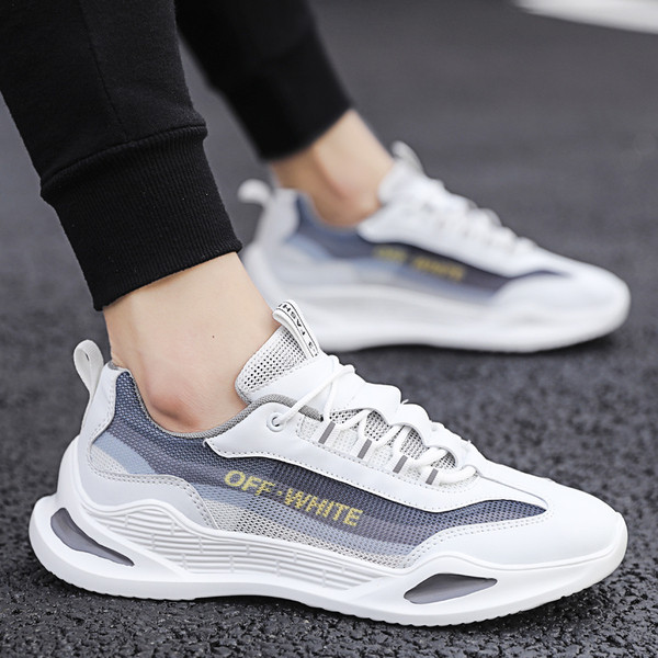 Modern férfi tornacipő fűzővel és felirattal