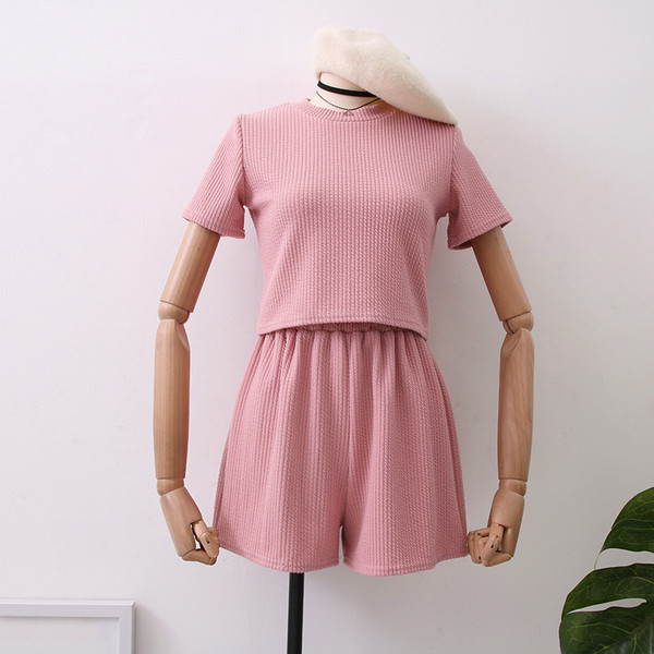 Ženski sportski set od tri dijela bez rukava, kratke hlače i bluze