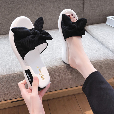 Παντόφλες μοντέρνες γυναίκες με επίπεδη σόλα και κορδέλα σε διάφορα χρώματα