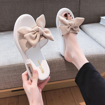 Παντόφλες μοντέρνες γυναίκες με επίπεδη σόλα και κορδέλα σε διάφορα χρώματα