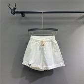 Női sportnadrág magas derékkal - széles modell