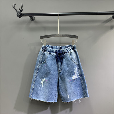 Lezser női 3/4-es nadrág szakadt motívumokkal, kék színben