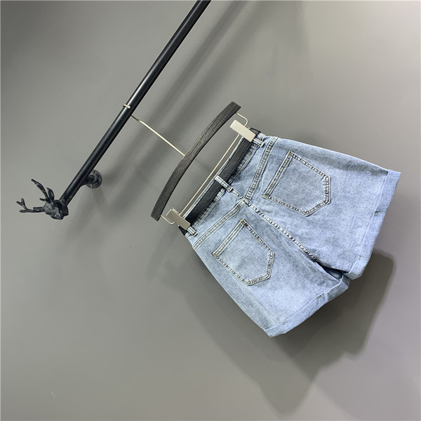 Új modell rövidnadrág kék övvel