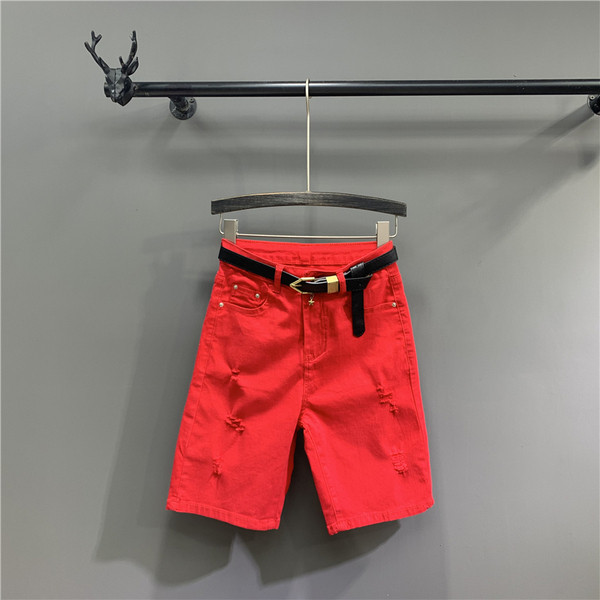 Női alkalmi nadrág övvel, szakadt motívumokkal