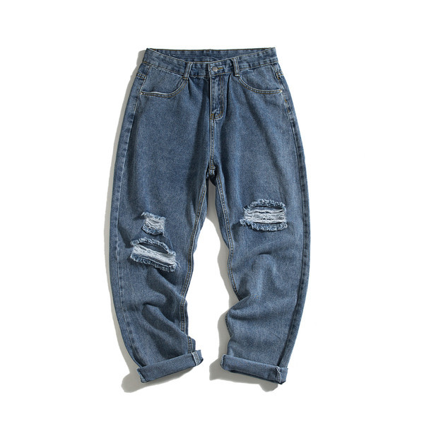 Széles férfi farmer, szakadt motívumokkal