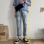 Nyári férfi farmer, szakadt motívummal passzolt modellel