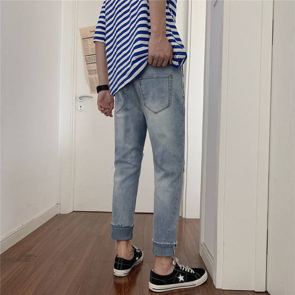 Nyári férfi farmer, szakadt motívummal passzolt modellel