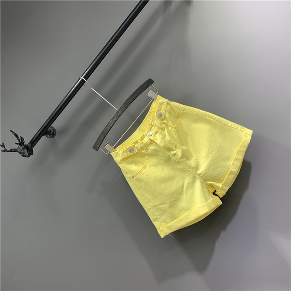 Női rövidnadrág új modell magas derékkal, sárga színben