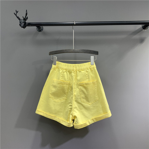 Női rövidnadrág új modell magas derékkal, sárga színben