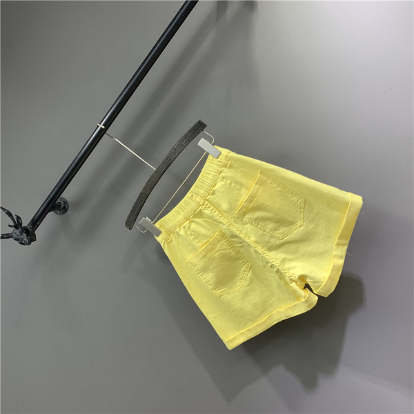 Női rövidnadrág új modell magas derékkal, sárga színben