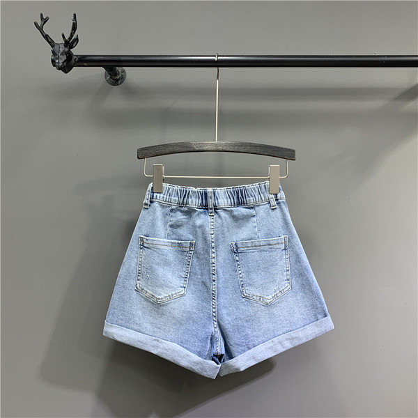 Uus sinist värvi teksapükste mudel naistele