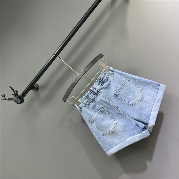 Uus sinist värvi teksapükste mudel naistele