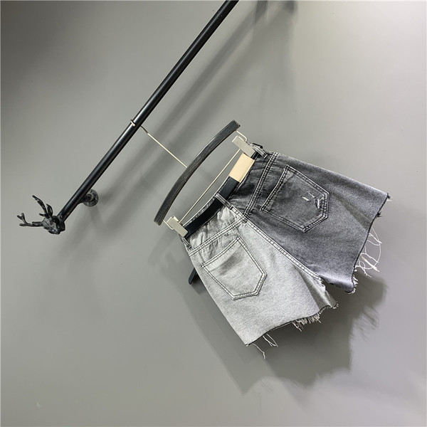 Női farmer rövidnadrág szakadt motívumokkal és övvel