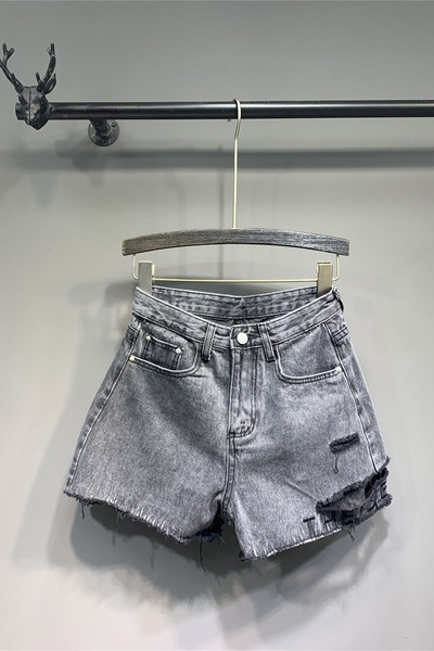 Rebenenud motiivide ja taskutega naiste vabaaja lühikesed püksid