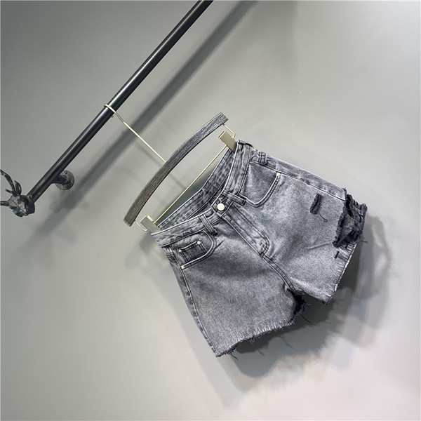 Rebenenud motiivide ja taskutega naiste vabaaja lühikesed püksid