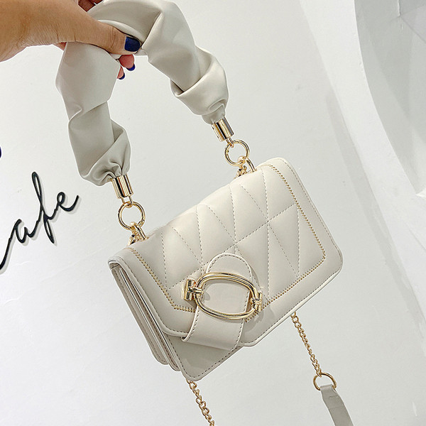 Stílusos női táska hosszú és rövid füllel, fém rögzítéssel