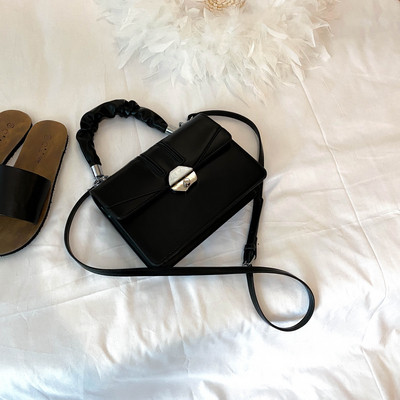 Σύγχρονη γυναικεία τσάντα από οικολογικό δέρμα με δύο λαβές