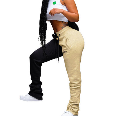 NAUJAS moteriškų sportinių kelnių modelis su dviejų spalvų su kaklaraiščiais