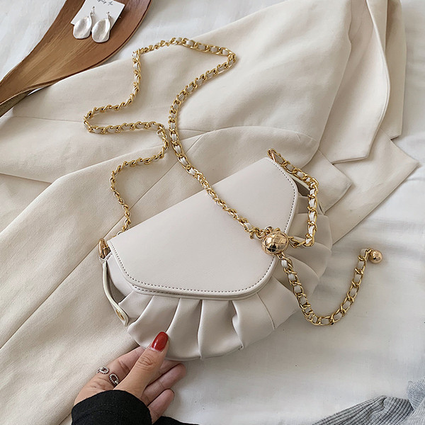 Eko bőrből készült stílusos női táska hosszú fémlánccal