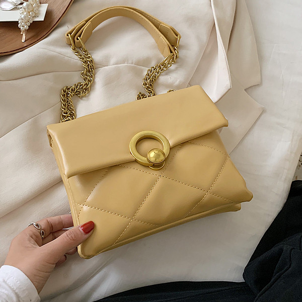 Öko-nahast ja metallist kinnitusega moodne naistekott