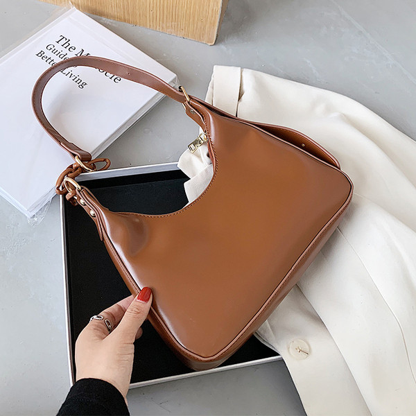 Naiste kaasaegne ökonahast ja lukuga kott