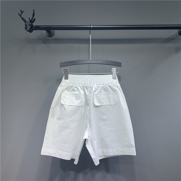 Fehér zsebes női sportnadrág