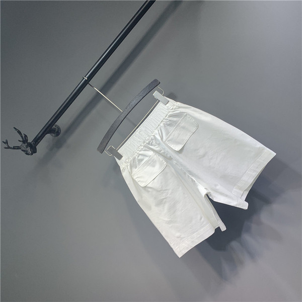 Fehér zsebes női sportnadrág