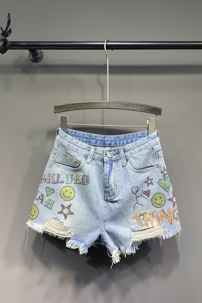 Modern női rövidnadrág rátéttel