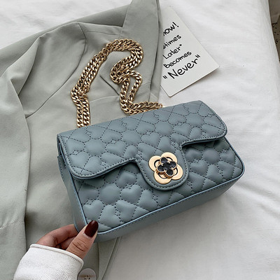 Modern női táska eko bőrből, fém rögzítéssel