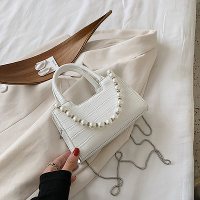 Σύγχρονη γυναικεία τσάντα με πέρλες και δύο λαβές