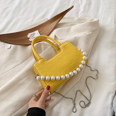 Σύγχρονη γυναικεία τσάντα με πέρλες και δύο λαβές