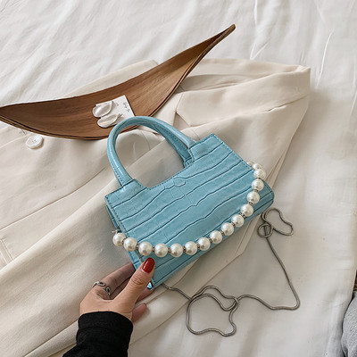 Σύγχρονη γυναικεία τσάντα με πέρλες και δύο λαβές