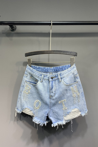 Farmer rövidnadrág szakadt motívumokkal - kék színben