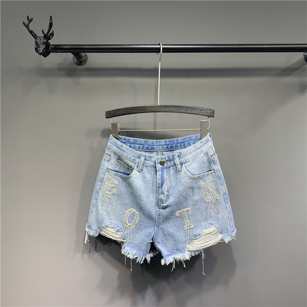 Farmer rövidnadrág szakadt motívumokkal - kék színben