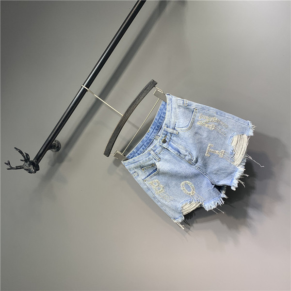 Farmer rövidnadrág szakadt motívumokkal - kék színben