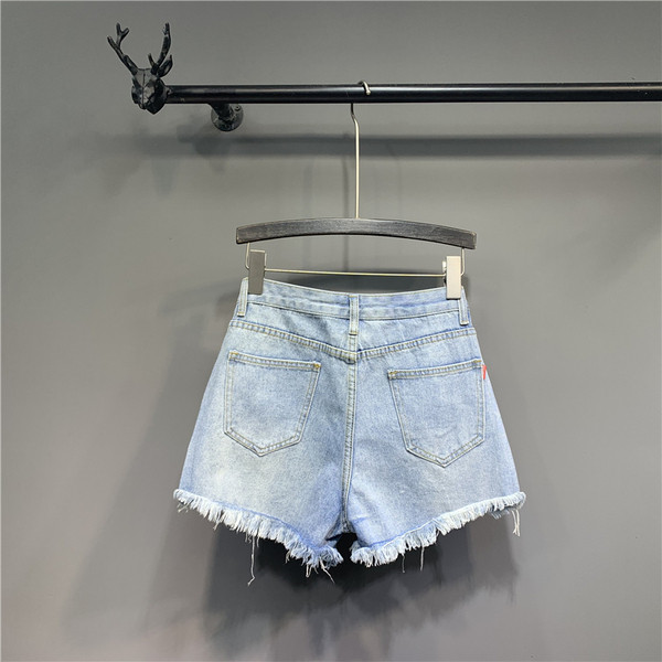 Farmer rövidnadrág szakadt motívumokkal - kék színben