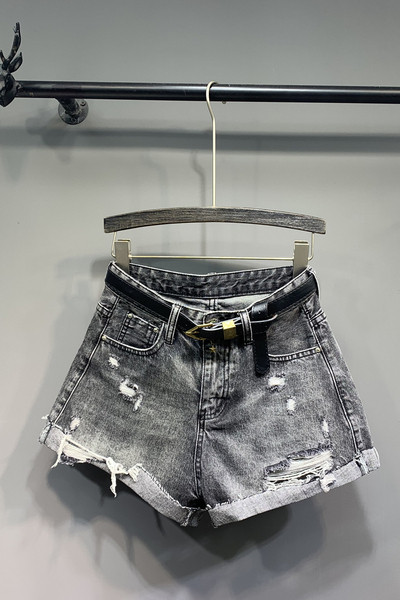 Modern női nadrág szakadt elemekkel - retro stílusú