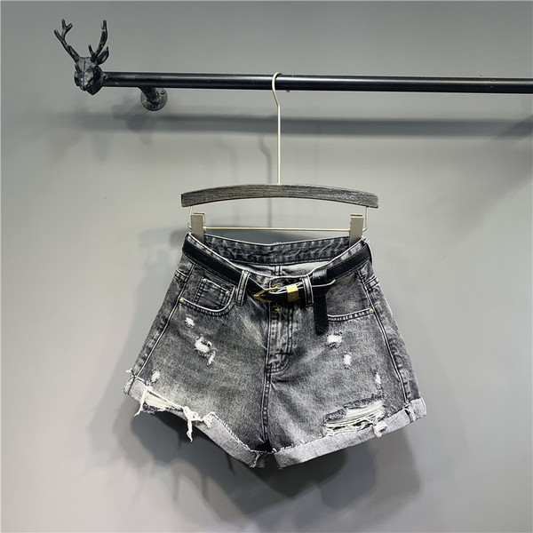 Modern női nadrág szakadt elemekkel - retro stílusú